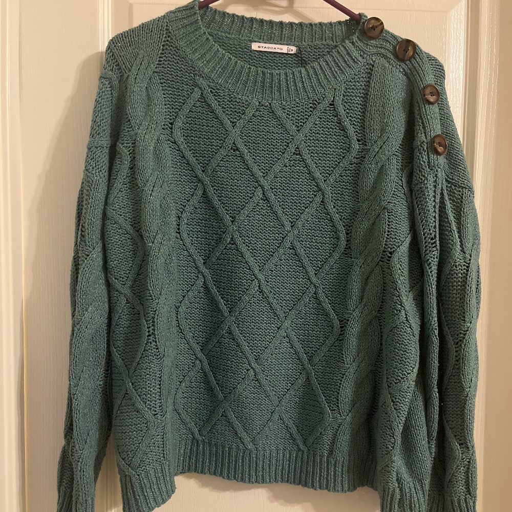 Cute green sweater that you can dress up or down
